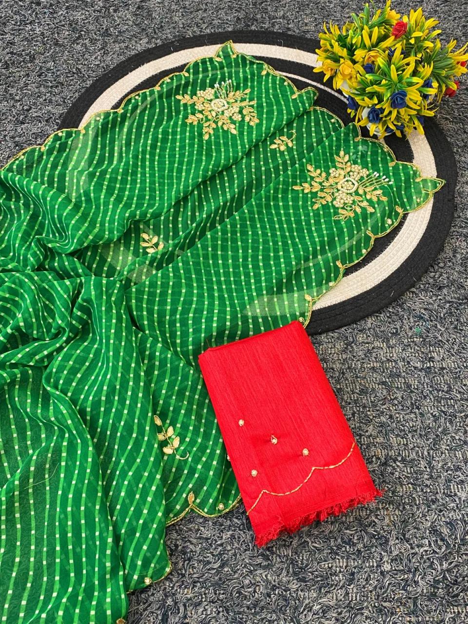 Premium Georgette Fabric Saree With Beautiful Mothda Leheriya Print Design With Beautiful Bead And Gotta Patti in Green