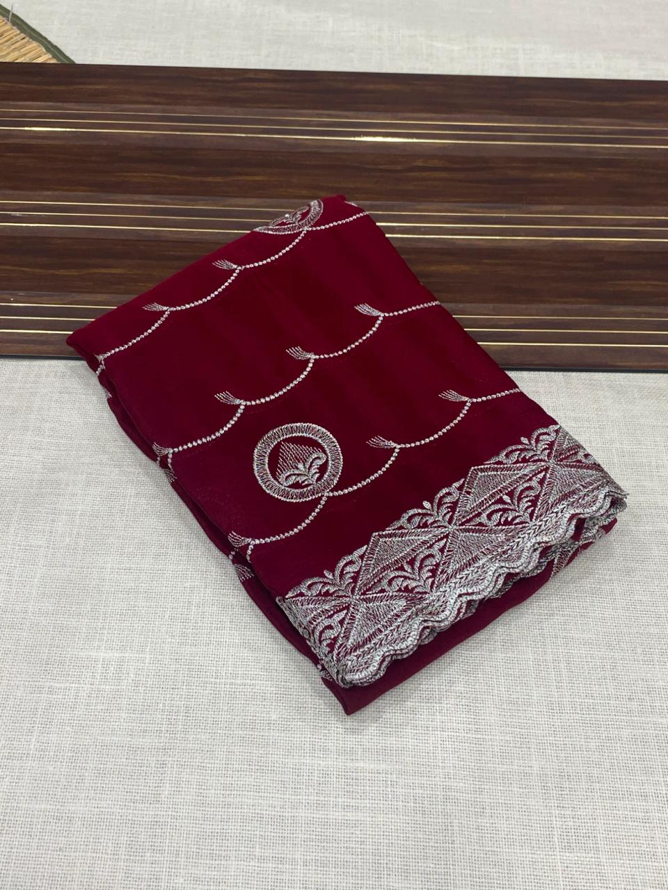 Stunning Designer Chinnon Silk Saree with Heavy Silver Embroidery and Contrast Blouse Piece in Rani