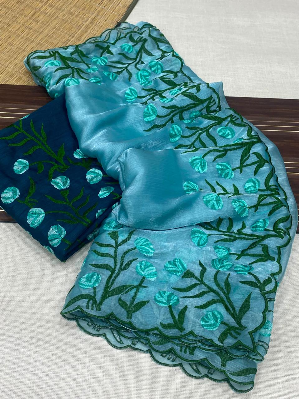 Soft Jimmy Chiffon Floral Embroidered Saree with Matching Blouse Piece in Aqua blue